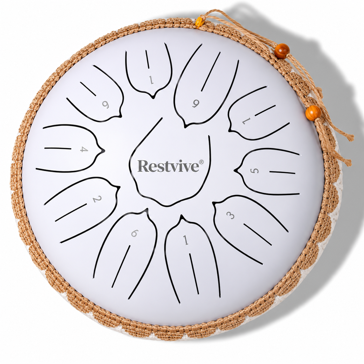 Top view of the white Restvive Serenity Steel Tongue Drum with eleven numbered tongues and woven rope trim